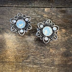 Opalescent lotus flower gauges body jewelry